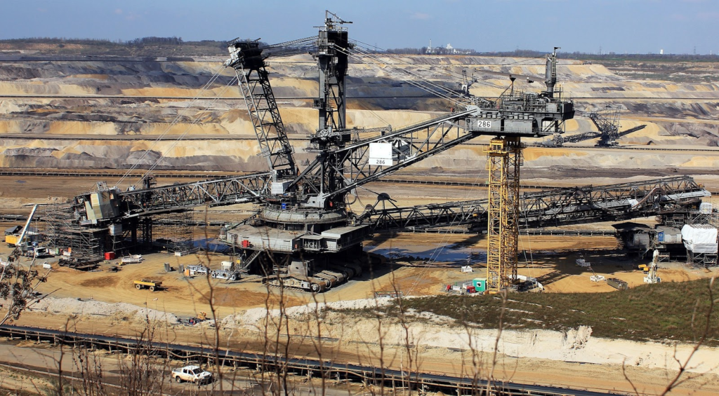 Workers using energy to work at a mining site