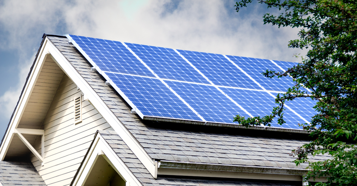 House with large solar panels installed on the roof