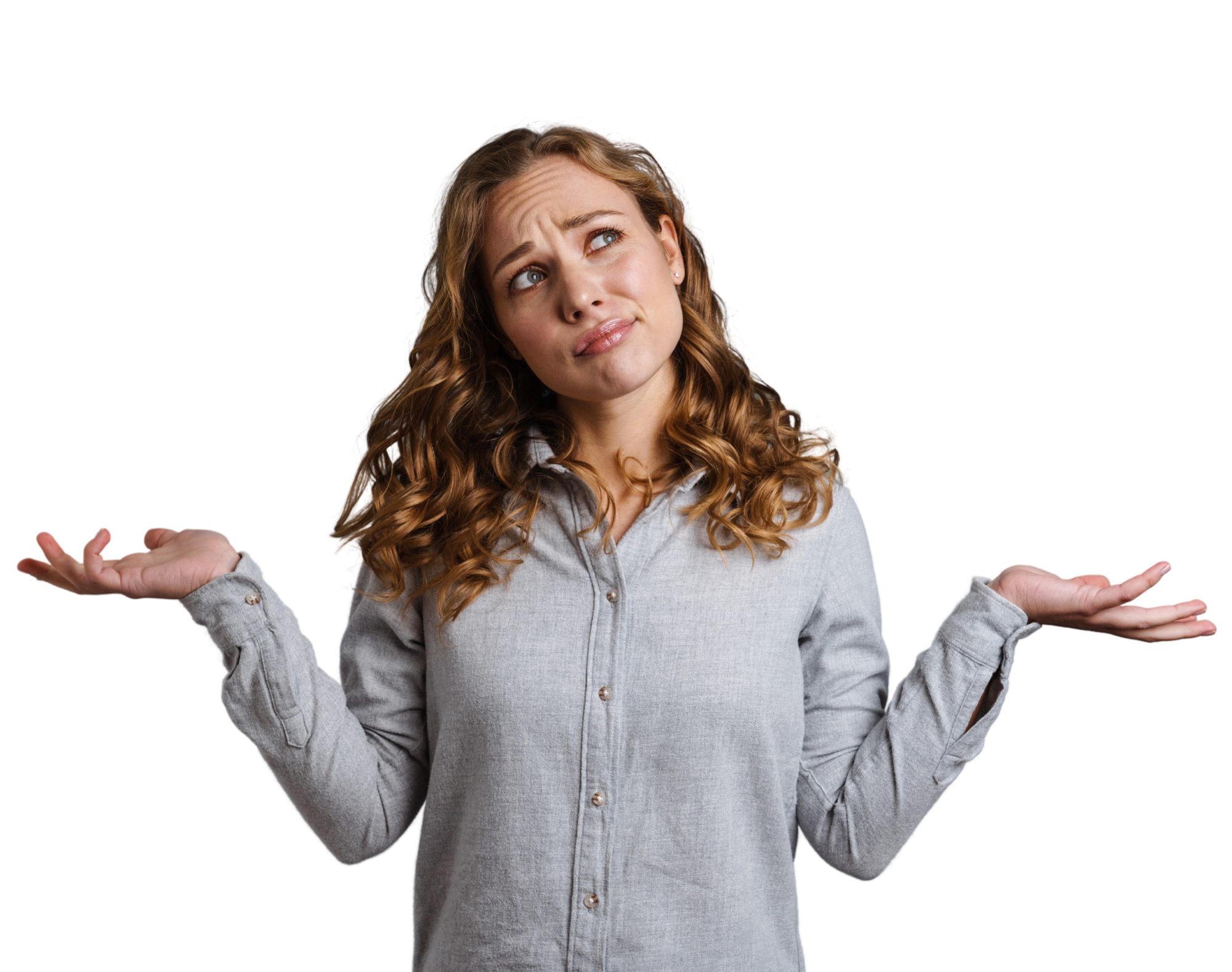 Young woman shrugging in on a white background