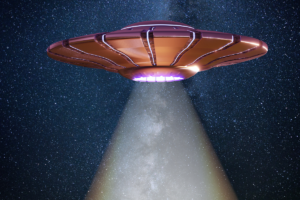 UFO spacecraft hovering above ground with a spotlight shining down through the night